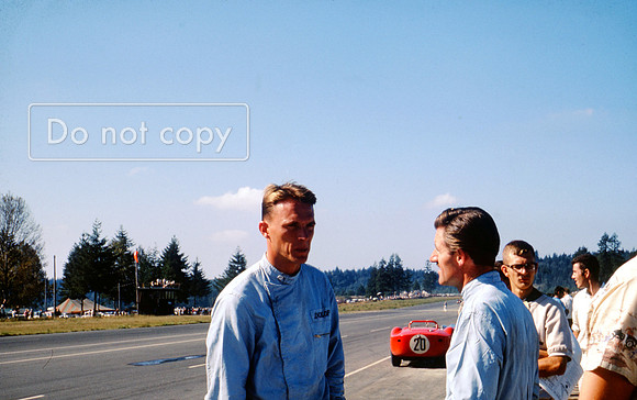 Graham Hill chats before the Pacific North west Grand Prix Kent 1963 lotus 23
