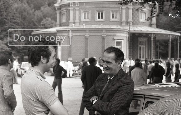 Gerry Birrell Works Ford Capri Driver chats at Scrutineering 1971