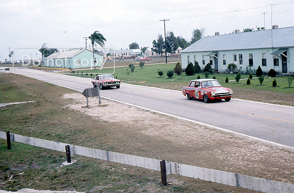 Alan Moffat Lotus Cortini persued by a Mercury Cougar Dan Gurney? Sebring 4 Hours 1967